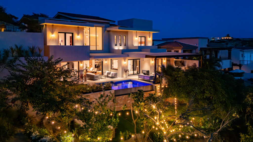 Los Cabos Los Valles Sophisticated and solidly built, this 5,588 sq.ft. estate in Club Campestre offers luxury living with exceptional construction quality rarely found in Los Cabos. Residents enjoy exclusive access to a private beach club and world-class golf course, all just minutes from San Jose vibrant dining and culture. The home features 4 ensuite bedrooms, a 3-stop elevator, and a Generac backup system. Entertain in style with a chef's kitchen, wine room with Tzalam wood cabinetry, and an outdoor BBQ area with fire pit. Relax by the heated pool or on the Jacuzzi terrace with partial ocean – 12 Los Valles, San Jose del Cabo, BS