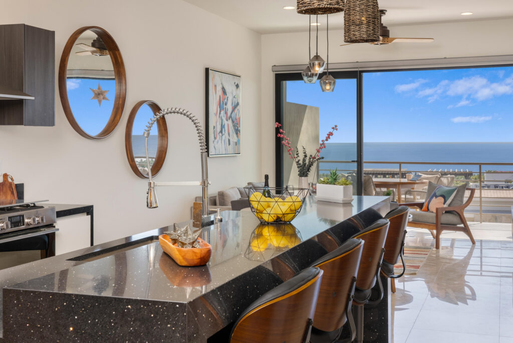 Los Cabos Vista Mare Condo for sale at Vista Mare, Cabo San Lucas, located on the third level within a private residential community in the Sunset area, one of Cabo's fastest-growing zones. Enjoy a peaceful setting just minutes from downtown, the Marina, restaurants, cafés, shops, supermarkets, and entertainment. This unit offers 111.15 m² total, including 97.65 m² of air-conditioned interior space and a 13.5 m² private terrace. It features 2 bedrooms, 2 full bathrooms, living and dining areas, an equipped kitchen, A/C, and 1 underground parking space. Vista Mare offers a gym, 2 pools, jacuzzi, and firepit social area. Ready for delivery. Price: – Camino del Parque, Cabo San Lucas, BS